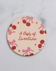 Cherry on Top Coaster Nude - قاعدة أكواب الكرز باللون البيج